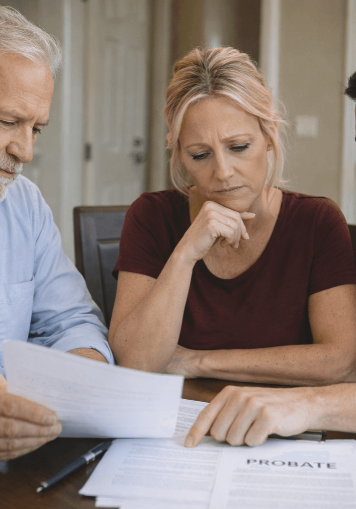 Orange County family reviewing documents together and learning about probate after inheriting a house